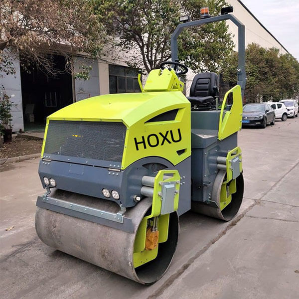 Articulated double drum vibratory road roller