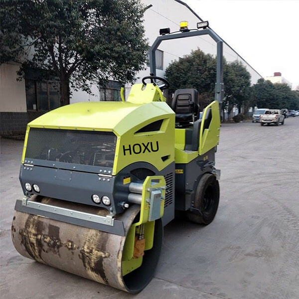 Articulated double drum vibratory road roller